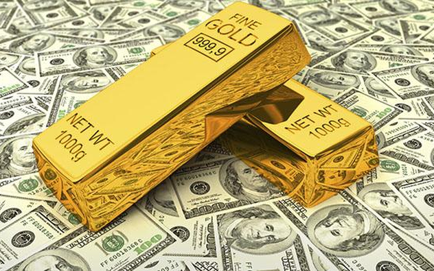 Đồng USD mạnh lên, giá vàng rời khỏi mức cao ba tuần